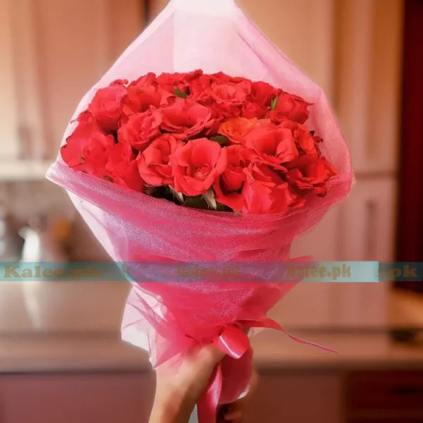 A bouquet of red rose flowers elegantly encased in a net wrapping