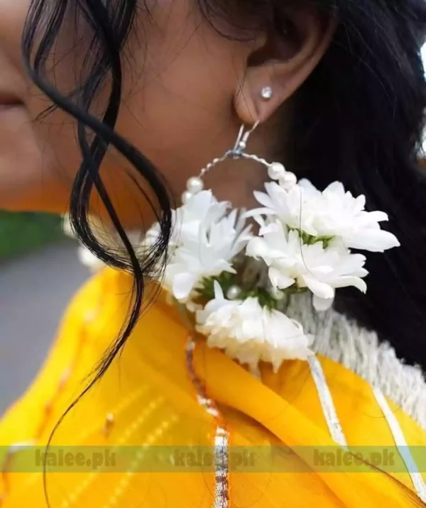 Image of delicate white daisy earrings
