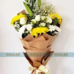 Flowers Bouquet with yellow daisies, lilies, and baby's breath, wrapped in decorative paper and finished with a satin ribbon.