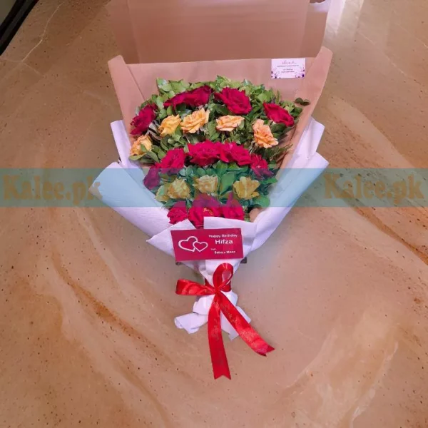 A vibrant bouquet of red and yellow roses, showcasing a blend of passion and joy in each bloom.