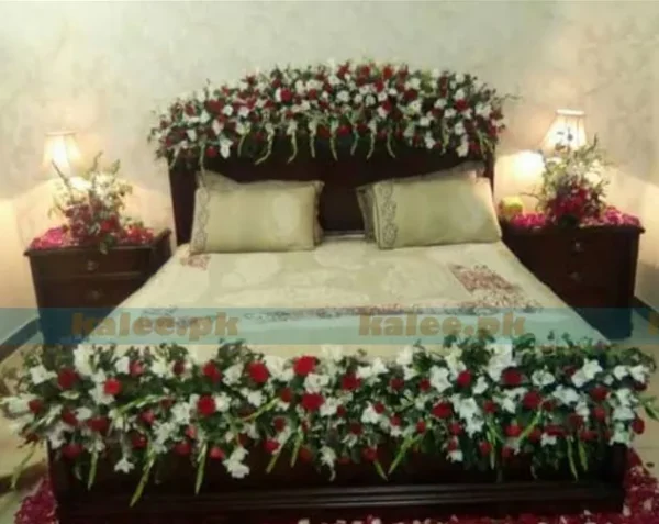 A bridal room adorned with red roses and white glades.