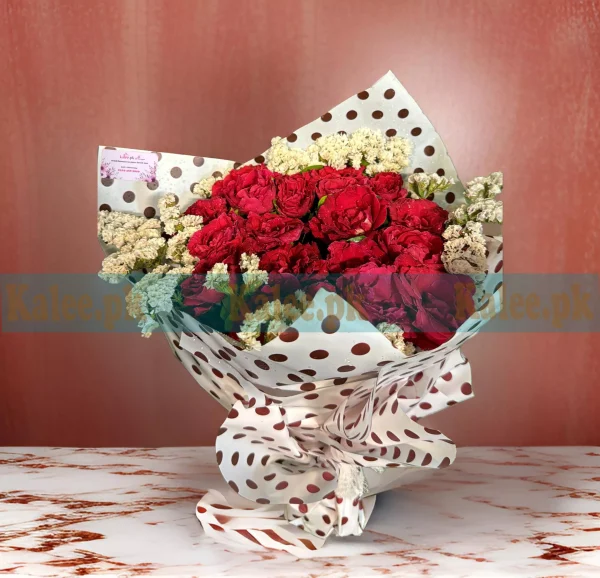 Red Rose Flowers Bouquet featuring premium red roses and statice flowers, beautifully wrapped for a refined and elegant look.