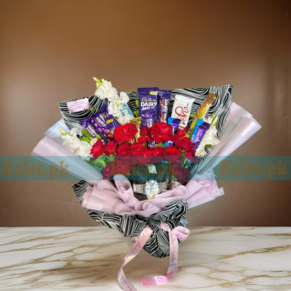 A bouquet with red roses and chocolates.