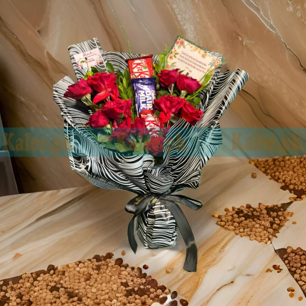 A bouquet with red roses and chocolates.