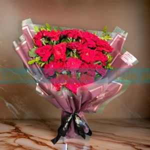 Presentable Rose Flowers Bouquet with fresh red roses, wrapped in elegant paper and finished with a satin ribbon.