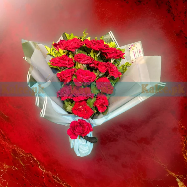 Splendid bouquet with fresh Red Rose Flowers, elegantly wrapped in high-quality paper and finished with a satin ribbon.