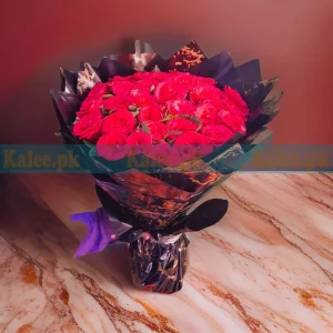 A stunning Red Rose Flowers Bouquet, elegantly arranged with fresh red roses, perfect for any special occasion.