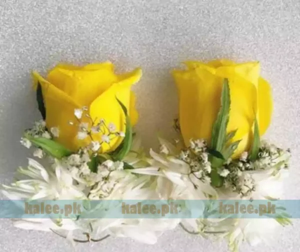 Yellow rose and star jasmine earrings with baby's breath adornment