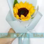 A single sunflower beautifully wrapped in classic paper.