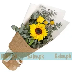 A single sunflower displayed in a beautifully designed vase.