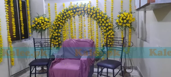 Stage adorned with stylish marigold flowers decoration
