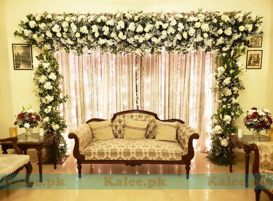 Wedding stage adorned with classy white daisy flowers decoration