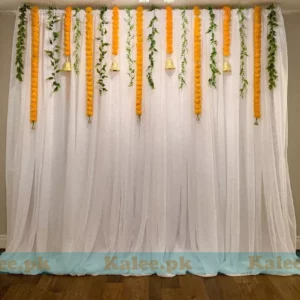 Stage adorned with stunning marigold flower decorations