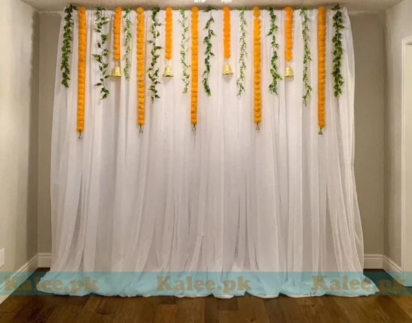 Stage adorned with stunning marigold flower decorations