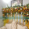 Stage adorned with white glades and daisy flowers