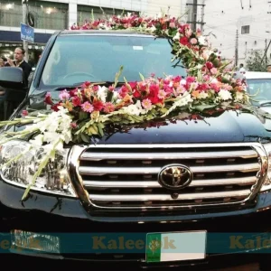 Luxury Car Adorned With Roses, Glades & Pink Daisy