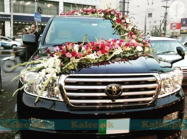 Luxury Car Adorned With Roses, Glades & Pink Daisy