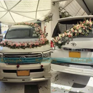 Land Cruiser adorned with pink and white glades decoration.