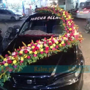 Car adorned with a variety of glades flowers decoration.