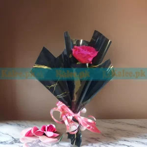 A beautifully wrapped Single English Red Rose Flower, elegantly arranged for a timeless and romantic gift.