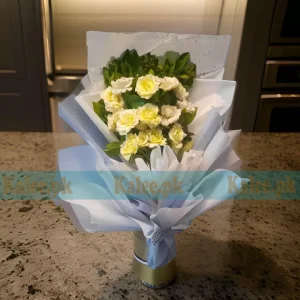 Bouquet of radiant English Yellow Roses elegantly wrapped in white fancy paper