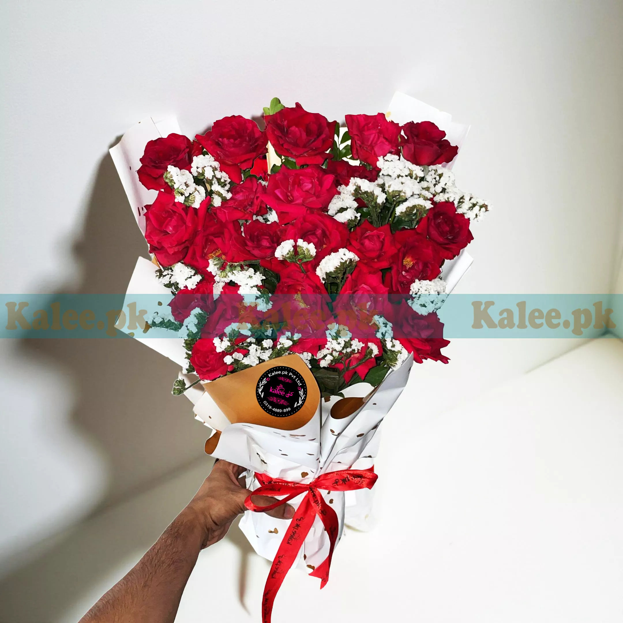 A stunning Statice Flowers Bouquet, elegantly arranged with fresh English red roses for a sophisticated and timeless floral gift.
