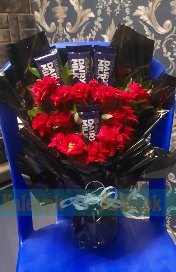 Bouquet Featuring Dairy Milk Chocolates and English Red Roses