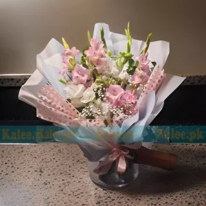 A delicate White Glades Bouquet, beautifully arranged with pink glades and baby’s breath for an elegant and graceful floral display.