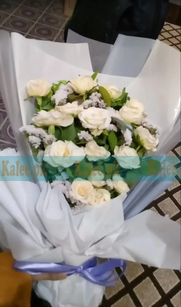 Bouquet of White English Roses and Statice Flowers in a Fancy Arrangement