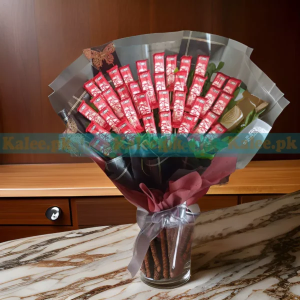 A bouquet featuring an assortment of KitKat chocolates arranged in a fancy presentation