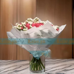 A stunning Bouquet with Red Roses, beautifully arranged with delicate statice flowers for a charming and elegant floral gift.