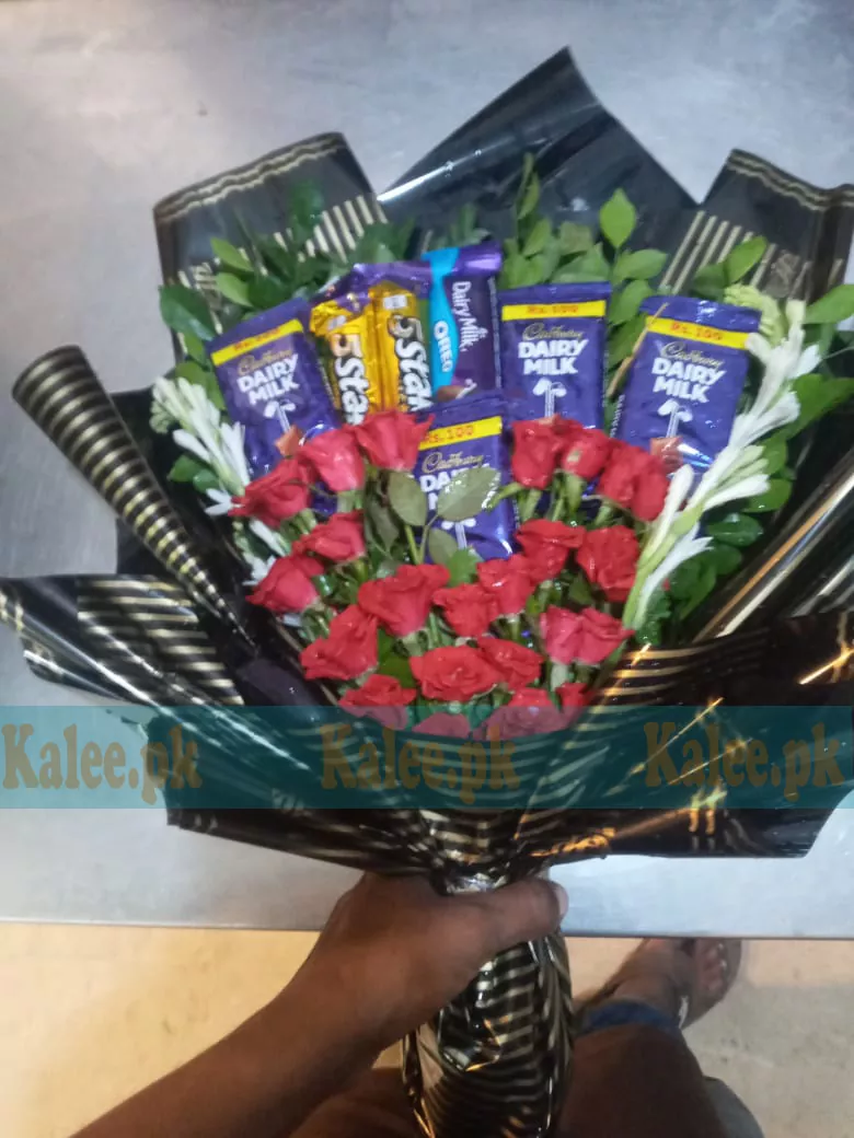 Chocolates Bouquet Surrounded by English Roses and Tuberose Flowers