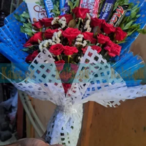 Bouquet Featuring Statice Flowers & English Red Roses Among Chocolates