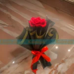 An opulent bouquet of handmade crochet red roses, crafted with luxury and elegance