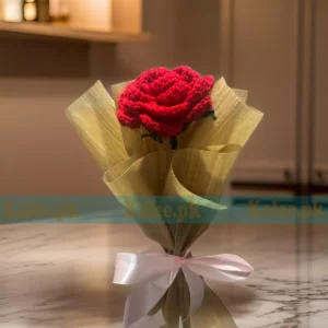 A divinely crafted crochet bouquet featuring handmade red roses, exuding floral grace for expressions of love