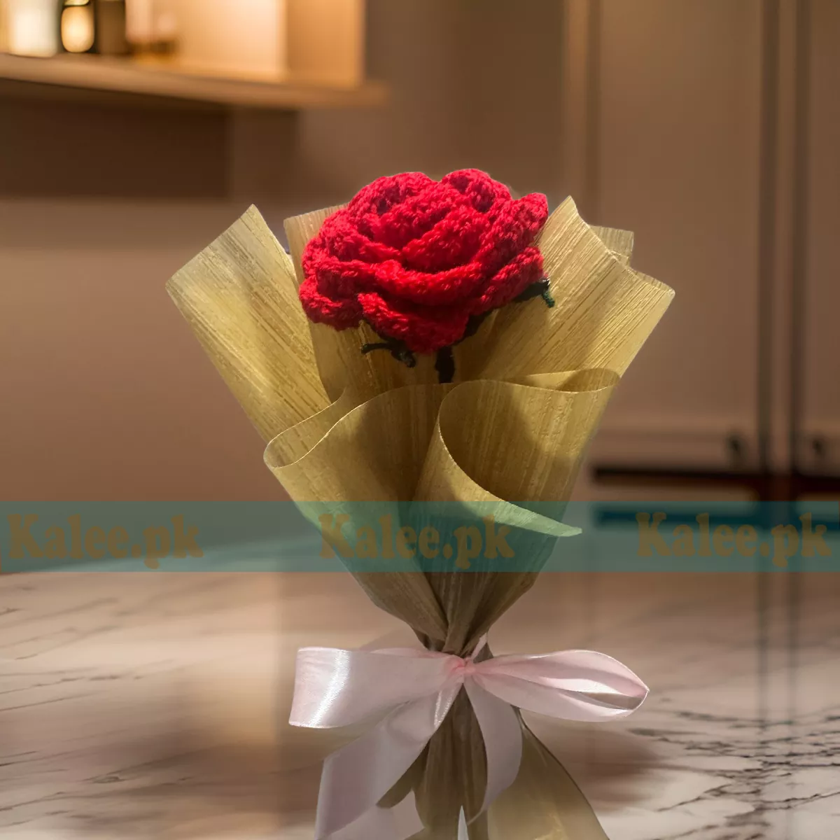A divinely crafted crochet bouquet featuring handmade red roses, exuding floral grace for expressions of love