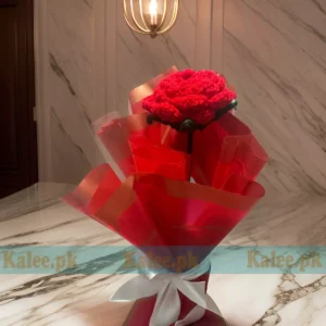 A charming crochet bouquet featuring exquisite handmade red roses