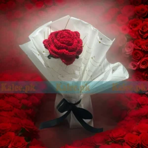 A majestic crochet bouquet of red roses, meticulously handcrafted, exuding royal floral elegance