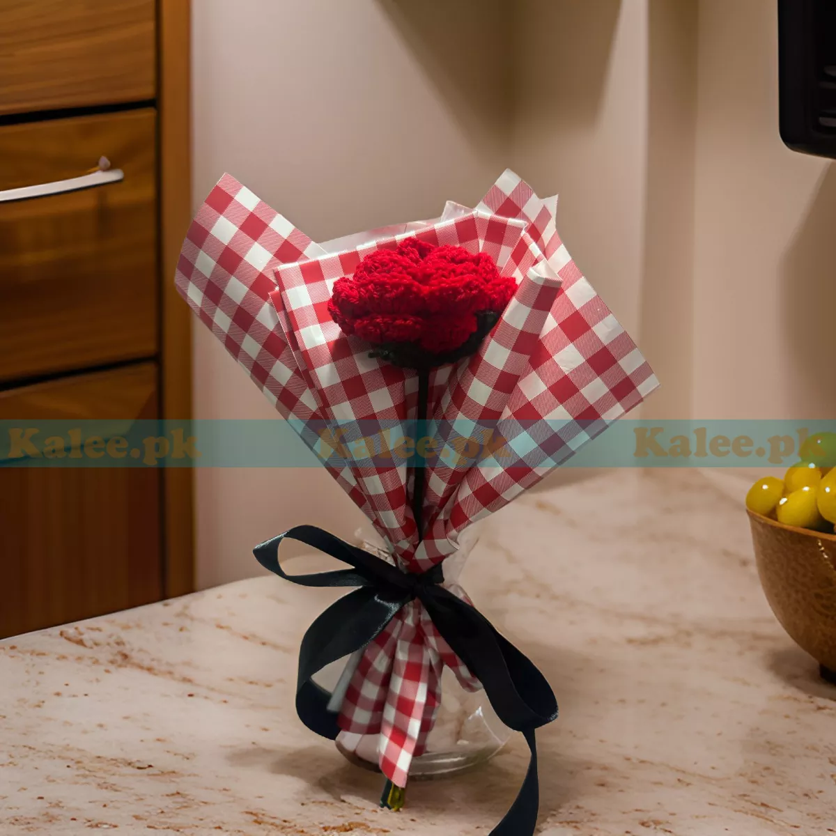 A radiant crochet bouquet of red roses, handmade with love, emitting a glowing floral delight