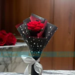 A bouquet of intricate crochet red roses, exuding timeless handcrafted elegance