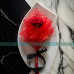 A captivating crochet flower bouquet featuring intricate red roses, handmade with love