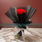 An enchanting crochet bouquet featuring intricate red roses, perfect for romantic gestures