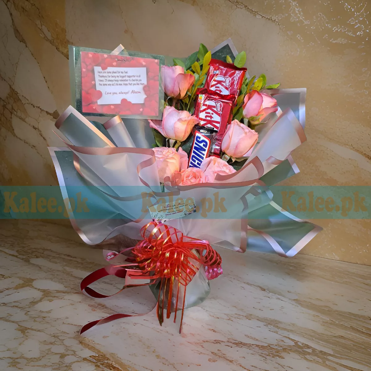 A luxurious Pink Rose Flowers bouquet paired with premium chocolates for a delightful and romantic gift.