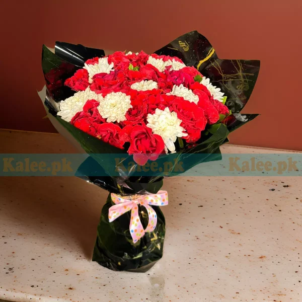 A breathtaking bouquet of red roses beautifully arranged and wrapped