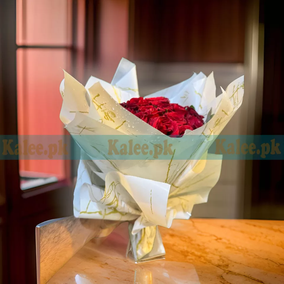 A beautiful Red Rose Flower Bouquet featuring real, fresh red roses elegantly arranged for a timeless floral gift.