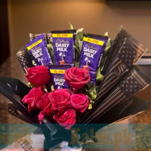 Rose Bouquet with Dairy Milk chocolates, elegantly wrapped with a satin ribbon.