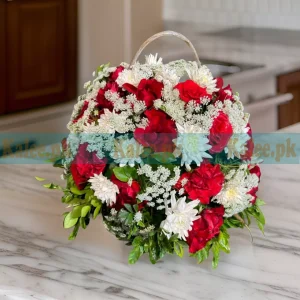 A basket filled with daisy flowers, red roses, and lacy lace accents.