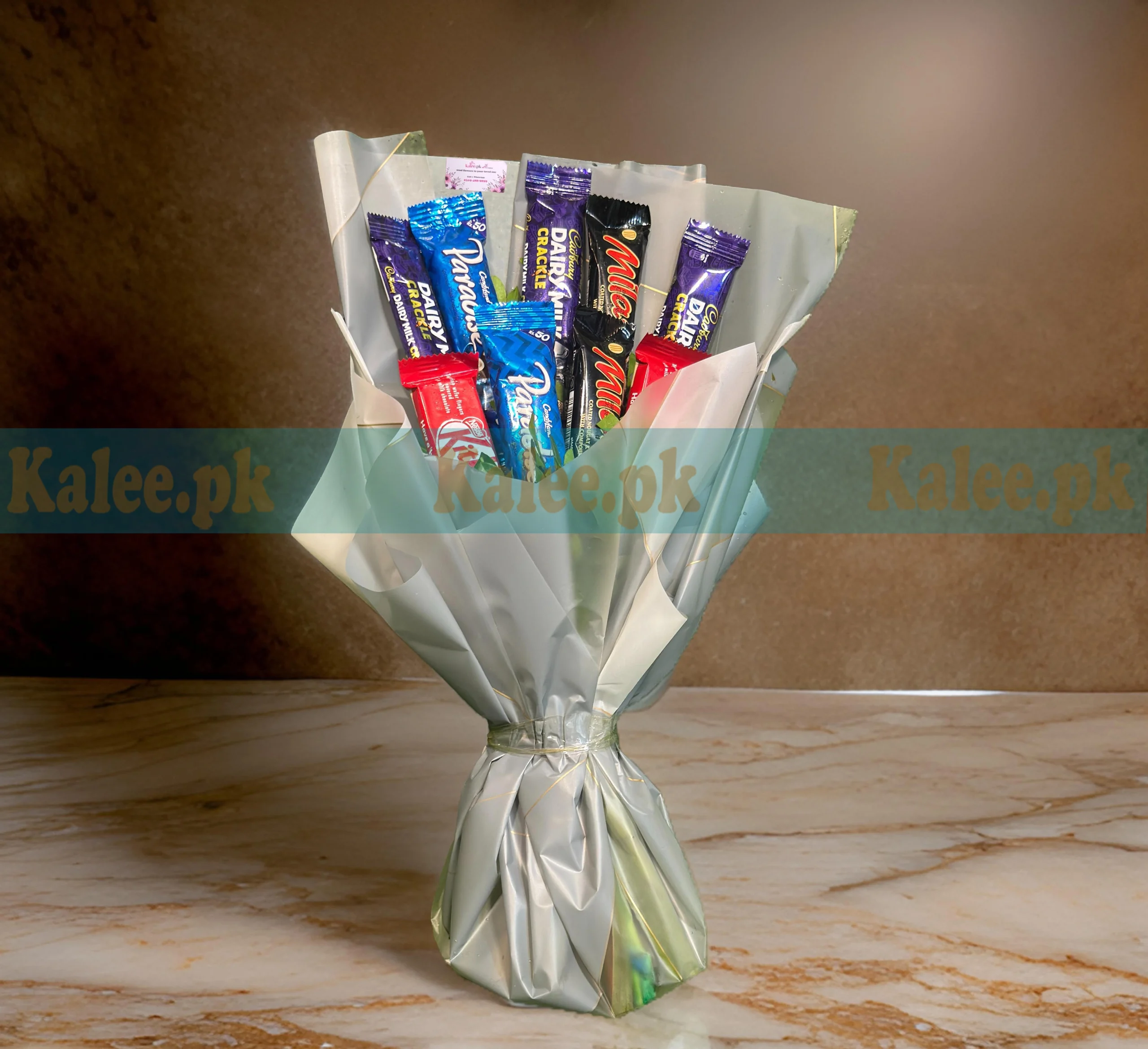 A classic design bouquet featuring chocolates.