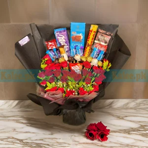 Chocolates Bouquet with Flowers, elegantly wrapped with a satin ribbon.