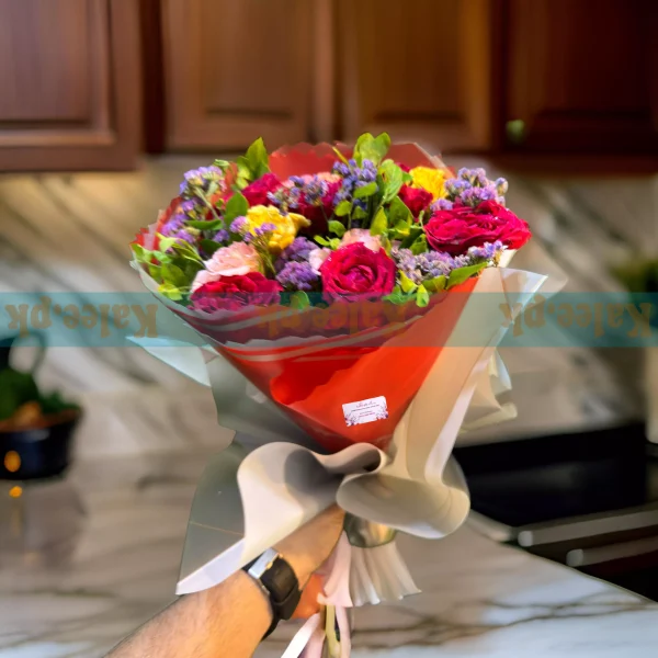 A decent bouquet featuring a mix of colorful flowers arranged elegantly.